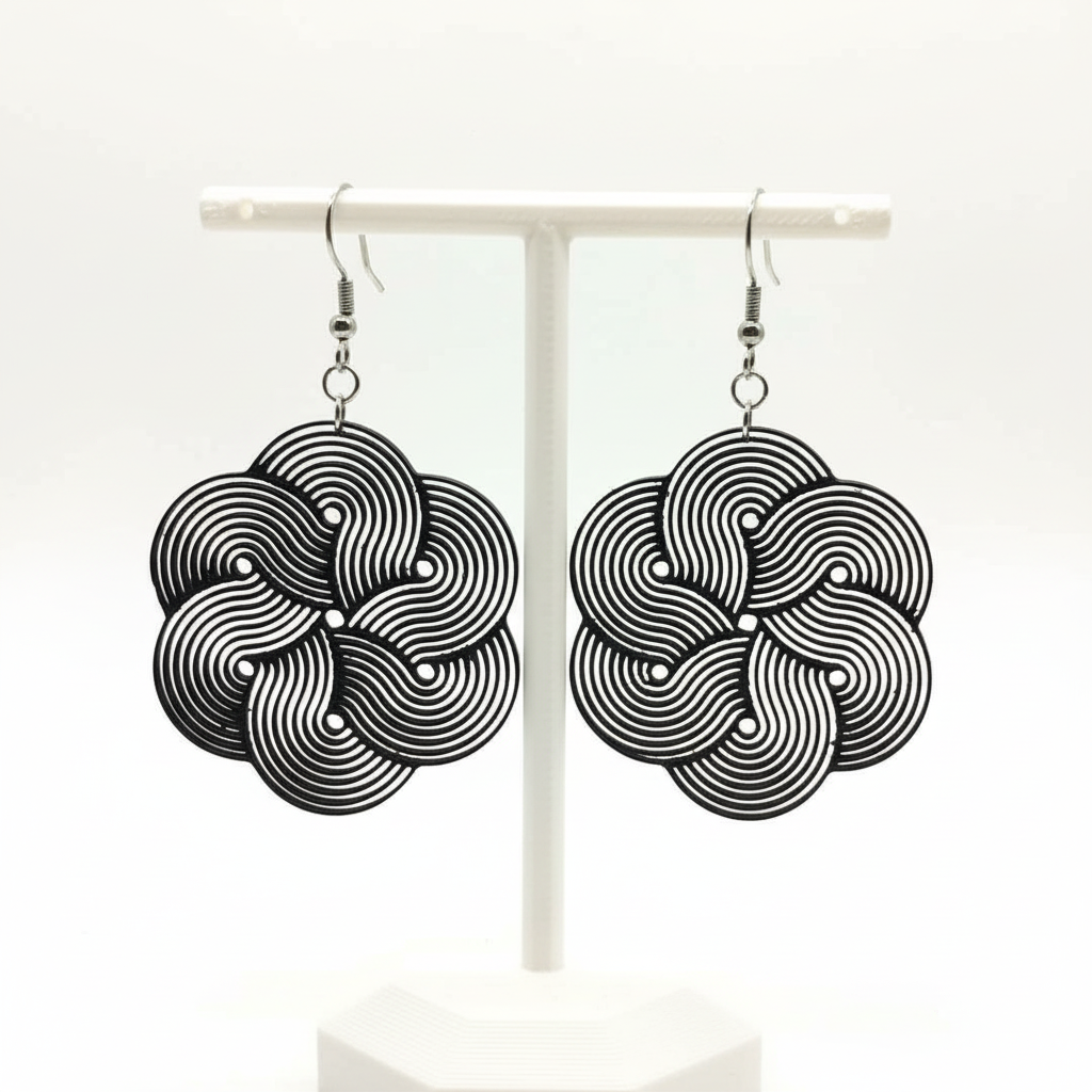 Black swirl 3D printed earrings pair elegant spiral design