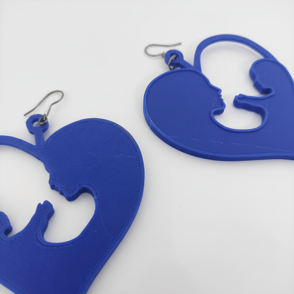 Close-up mother child heart earrings intricate design details symbolism
