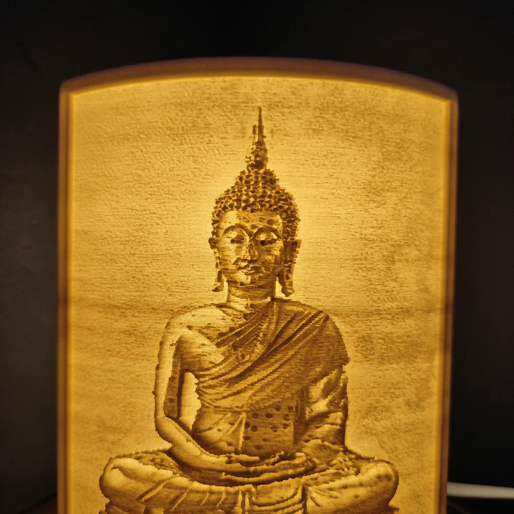 Carved wood Buddha artwork illuminated, meditation decor from The Sculpt Studio